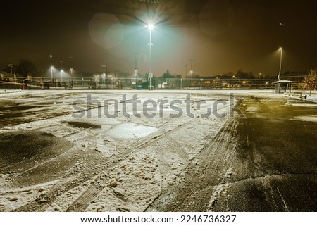 Portsmouth, NH: Public pickleball  basketball courts at night in the snow