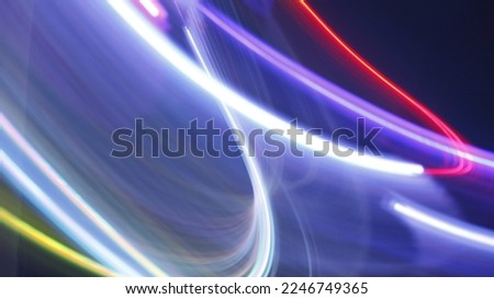 Abstract photo of light trails in long exposure.
