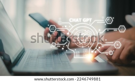 ChatGPT Chat with AI or Artificial Intelligence. woman chatting with a smart AI or artificial intelligence using an artificial intelligence chatbot developed by OpenAI. Royalty-Free Stock Photo #2246749881