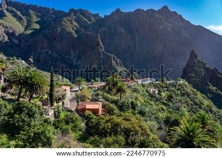 Active on Tenerife, Canary Islands: The Masca Gorge in the northwest - Panoramic view from above of the beautiful village of Masca Royalty-Free Stock Photo #2246770975