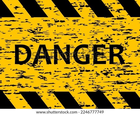 Increased danger. The tape is protective yellow with black. Caution and warning. Stop do not cross.