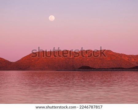Moon rising over Lake Argyle in Western Australia