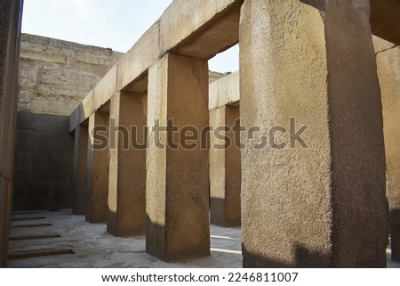 Massive Pillars within the Valley Temple of Khafre, also known as the Granite Temple. Khafre's temple complex is substantially preserved. Royalty-Free Stock Photo #2246811007