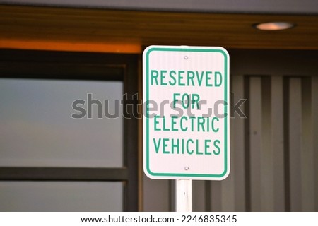 reserved for electric vehicles sign