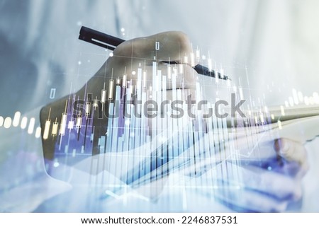 Multi exposure of abstract financial diagram with hand writing in notepad on background, banking and accounting concept