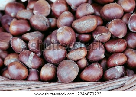 chestnuts on the market stall, chestnut photo background, selective focus.
