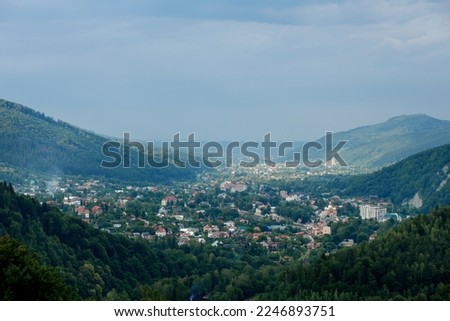 A small village among the mountains in the Carpathians. Mountain landscape.