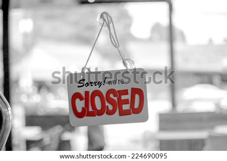 closed sign board hang on the door (Red color selection on this picture)