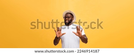 Portrait shock and annoyed displeased young man raising hands up to say no stop right there isolated orange background. Negative human emotion, facial expression, sign, symbol, body language. Royalty-Free Stock Photo #2246914187