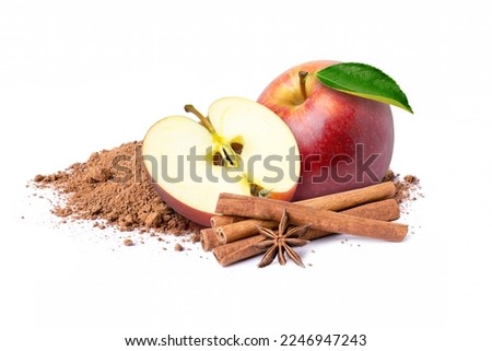 Red apple with cinnamon powder and cinamon stick isolated on white background. Royalty-Free Stock Photo #2246947243