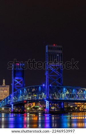 A night time photo of The Main Street Bridge in downtown Jacksonville Florida