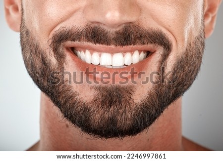 Smile, mouth and teeth whitening of man on studio background of wellness. Closeup male model face with clean dental, fresh breath and happy tooth implant, aesthetic beauty or healthy cosmetic results Royalty-Free Stock Photo #2246997861