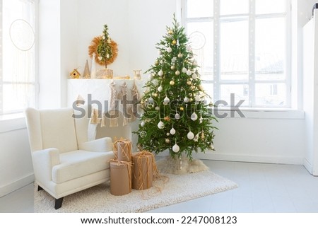 Christmas tree decorated with golden ball toys on a blurry, sparkling and fabulous fairy tale background with beautiful bokeh, copy space.