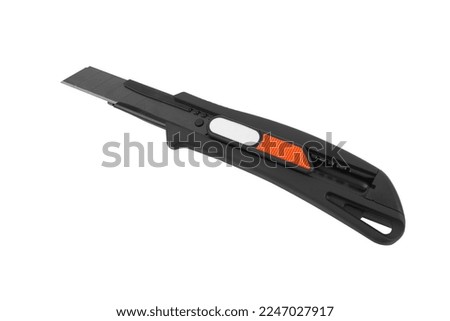 Black utility knife isolated on a white background