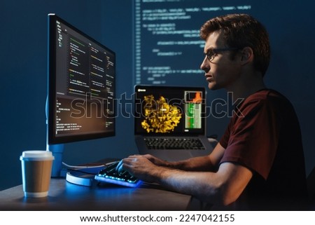Profile view portrait of young guy data scientist working at pc at home late night, debugging script cyber space error, isolated on wall with zoomed digital page Royalty-Free Stock Photo #2247042155