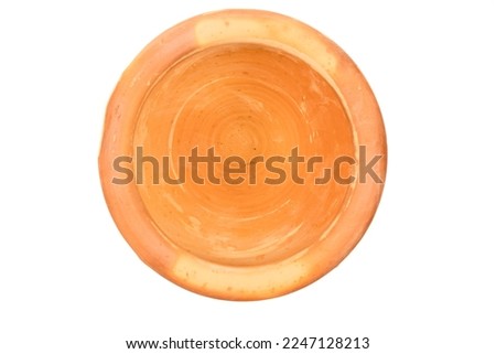 Mortar and Pestle isolated on white background.mortar is a tool for finely grinding herbs in Asian cuisine.handmade earthenware mortar.top view.