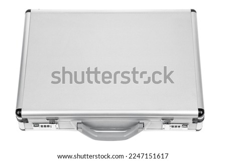 Metal case on white background. Metallic rivets of a road case. Photo of a isolated road case or flight case with reinforced metal corners and wheels. 