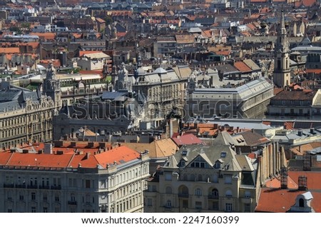 Budapest, Hungary, Europe skyline. Rooftop view of Ferenciek Square from Gellert Hill. Buildings, towers, and colorful cityscape. Historical downtown neighborhood houses, Hungarian urban landscape. Royalty-Free Stock Photo #2247160399