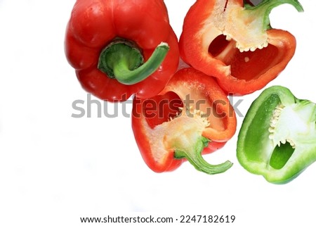 red and green peppers with white background no people stock photo 