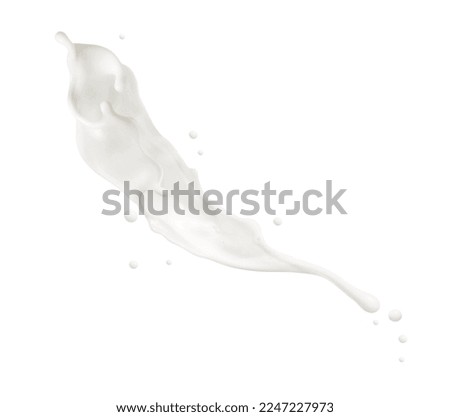 Milk splashes and drops in the air isolated on a white background 