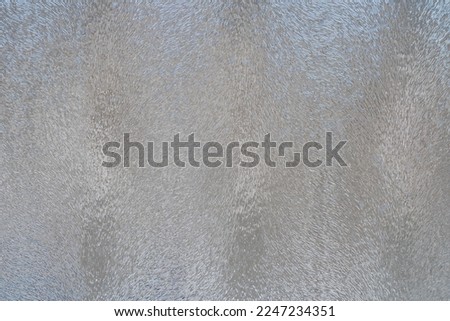 Closeup Frosted Glass Thick Film for reduces visibility across. Office films privacy for bathroom Office meeting room. Close up photo.