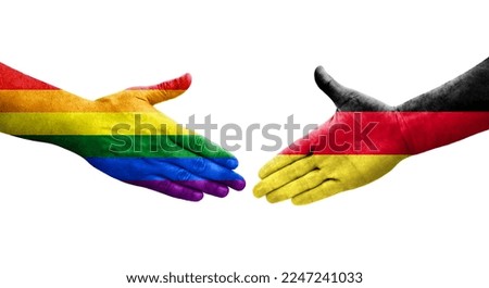 Handshake between Germany and LGBT flags painted on hands, isolated transparent image.