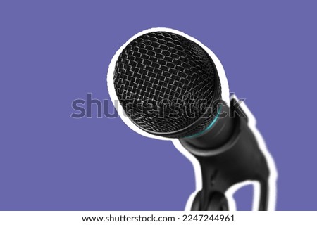 Classic modern microphone on colored background
