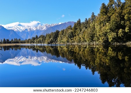Beautiful lake Matheson in Westland National Park New Zealand Royalty-Free Stock Photo #2247246803