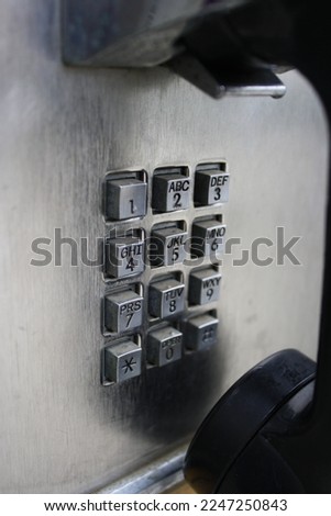 Close up of Old Style payphone's keypad Royalty-Free Stock Photo #2247250843