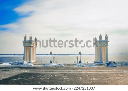 View of the snow-covered city embankment on a clear winter day. Urban architecture Royalty-Free Stock Photo #2247251007