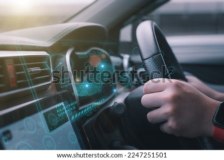 a futuristic vehicle and a graphic user interface (GUI). connected, intelligent vehicles "Internet of Things" heading-up display (HUD)