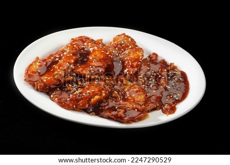 Kindo prawns (Shrimp) is a popular Indo-Chinese delicacy all over India. Battered shrimps, Chinese cuisine pictures, isolated on Black background.