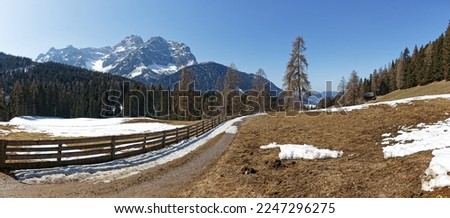 Panoramic view to snow covered mountain peaks of the Sesto Dolomites in Winter. Alps, South Tyrol, Alto Adige, Italy, Europe