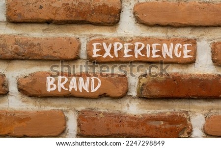 Brand experience symbol. Concept words Brand experience on brown brick wall. Beautiful brown brick wall background. Business branding and brand experience concept. Copy space.