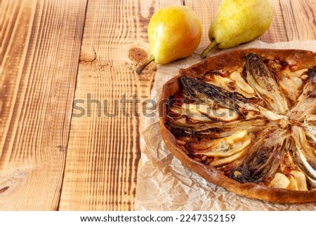 Sweety salty homemade chicory and pear tart