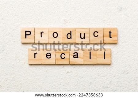 product recall word written on wood block. product recall text on table, concept.