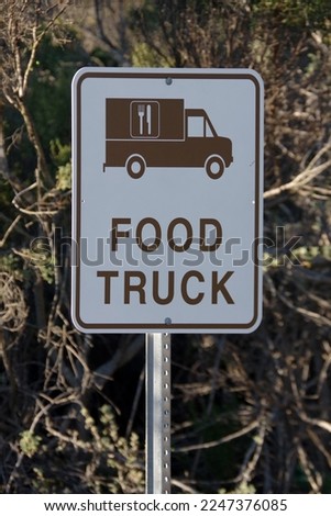 Posted FOOD TRUCK parking sign