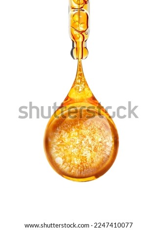 drop of serum oil, essential oil Royalty-Free Stock Photo #2247410077