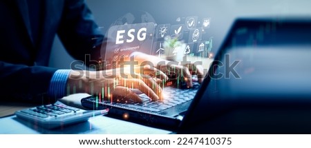 Environmental stocks and funds. ESG environmental social governance investment business concept. Businessman analyzing stock market and social and environmental investment. business background