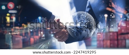 Smart logistics, Global business concept. Businessman making handshake for successful business, investment deal teamwork and partnership business partners on logistic global network and supply chain Royalty-Free Stock Photo #2247419295