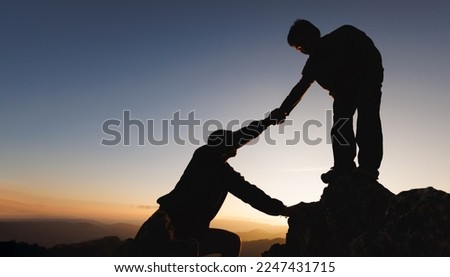 People helping each other concept.People helping and, team work concept. Lending a helping hand.  Royalty-Free Stock Photo #2247431715
