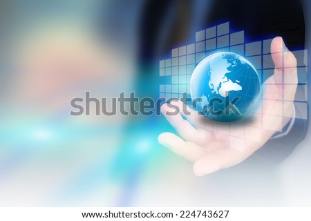 hand holding digital world.