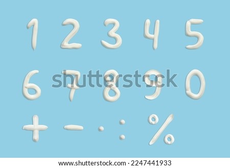numbers of English alphabet in the form of squeezed cream in white on a blue background. Royalty-Free Stock Photo #2247441933