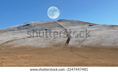 The moon on top of the hill