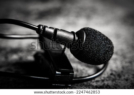 Close-up view of a lavalier microphone. Sound or voice equipment for recording.