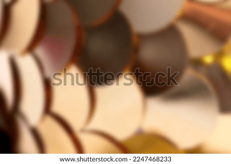Abstract blurred broze circles for beauty festive background.