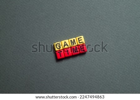 Game time - word concept on cubes, text, letters