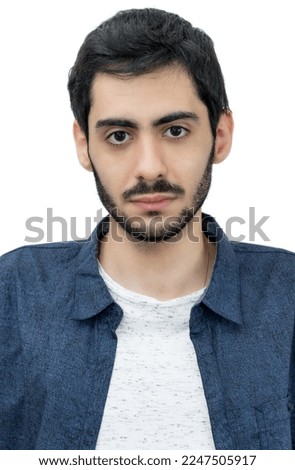 Passport photo of serious turkish man with beard and black hair isolated on white background to cut out
