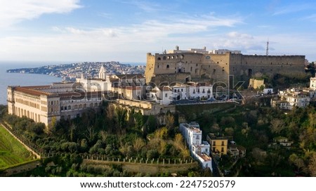 Aerial view of the Charterhouse of St. Martin, a former monastery complex, now a national museum, and Sant' Elmo castle. They are located on Vomero hill, that commands the city of Naples in Italy. Royalty-Free Stock Photo #2247520579