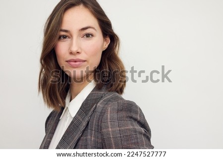 Portrait of beautyful and confident business woman	 Royalty-Free Stock Photo #2247527777